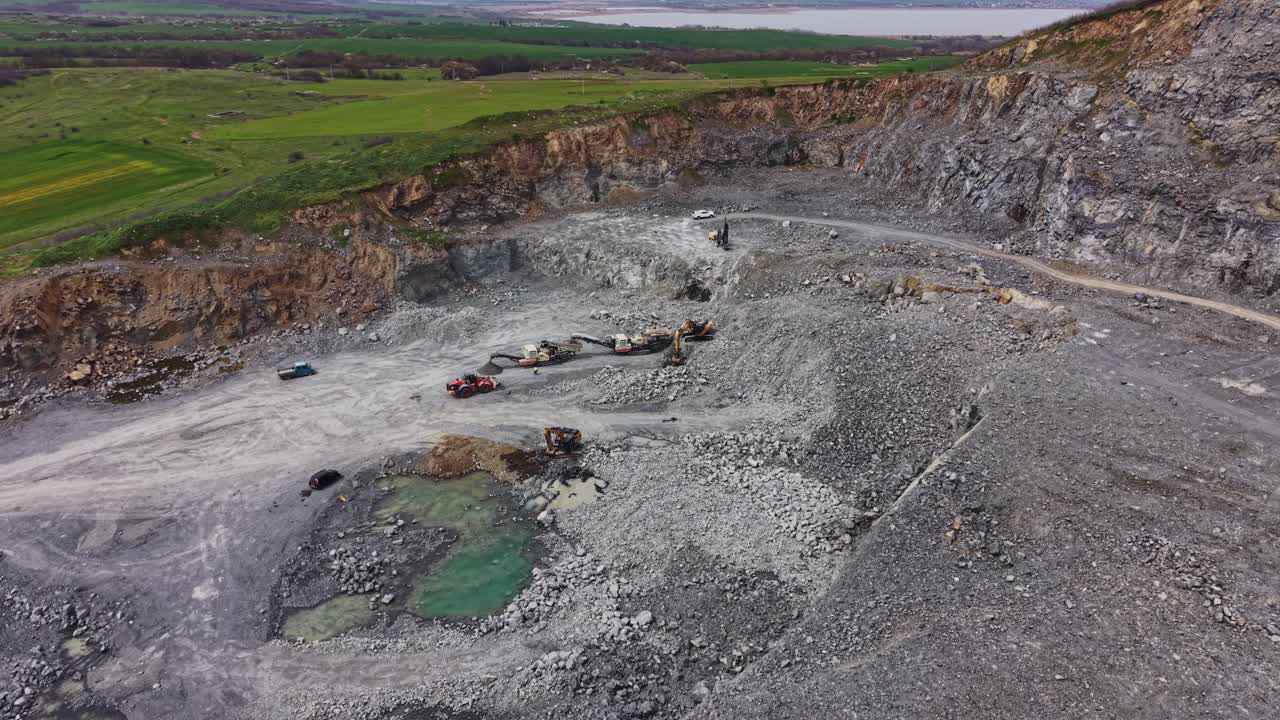 Aerial View of a Large Industrial Quarry with Heavy Machinery