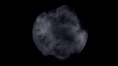 smoke fills a glass sphere.