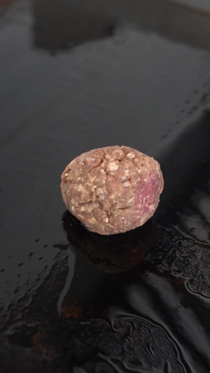 A Chief cooks meat on a grill, close up shot, insert shot