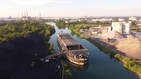 Boat-Anchored-At-A-Side-Of-The-Road-By-The-Water-Treatment-Facility-in-Detroit-MIchigan--wide-shot