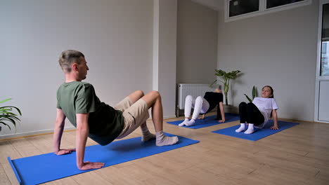 people practising yoga