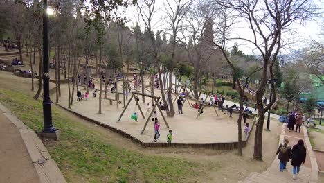 park with playground, children, and people