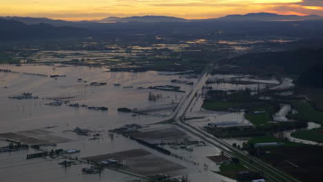 flooded infrastructure and roads west canada state of emergency aerial