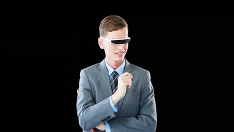 Businessman-in-virtual-video-glasses-using-digital-screen