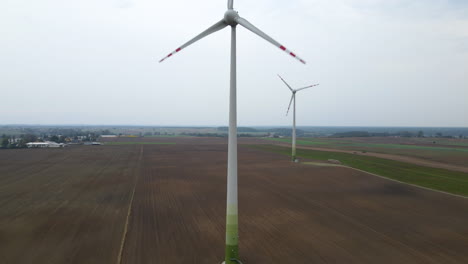 Windmills-In-A-Rural-Farm-In-Poland---Aerial-Drone-Shot