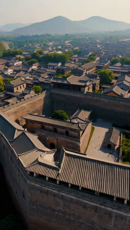 aerial view of an ancient chinese city with walled fortifications