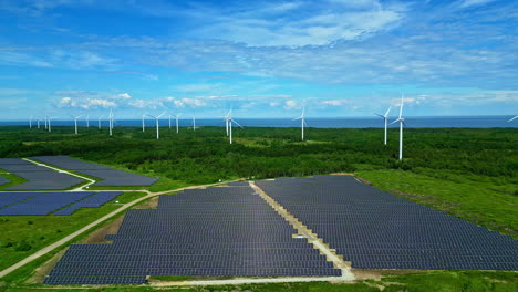 Paldiski-Wind-Park-of-wind-turbines-seen-from-above-with-solar-panels-on-the-foreground