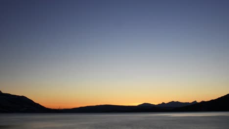 sunset at rombaksfjord in northern norway near city of narvik