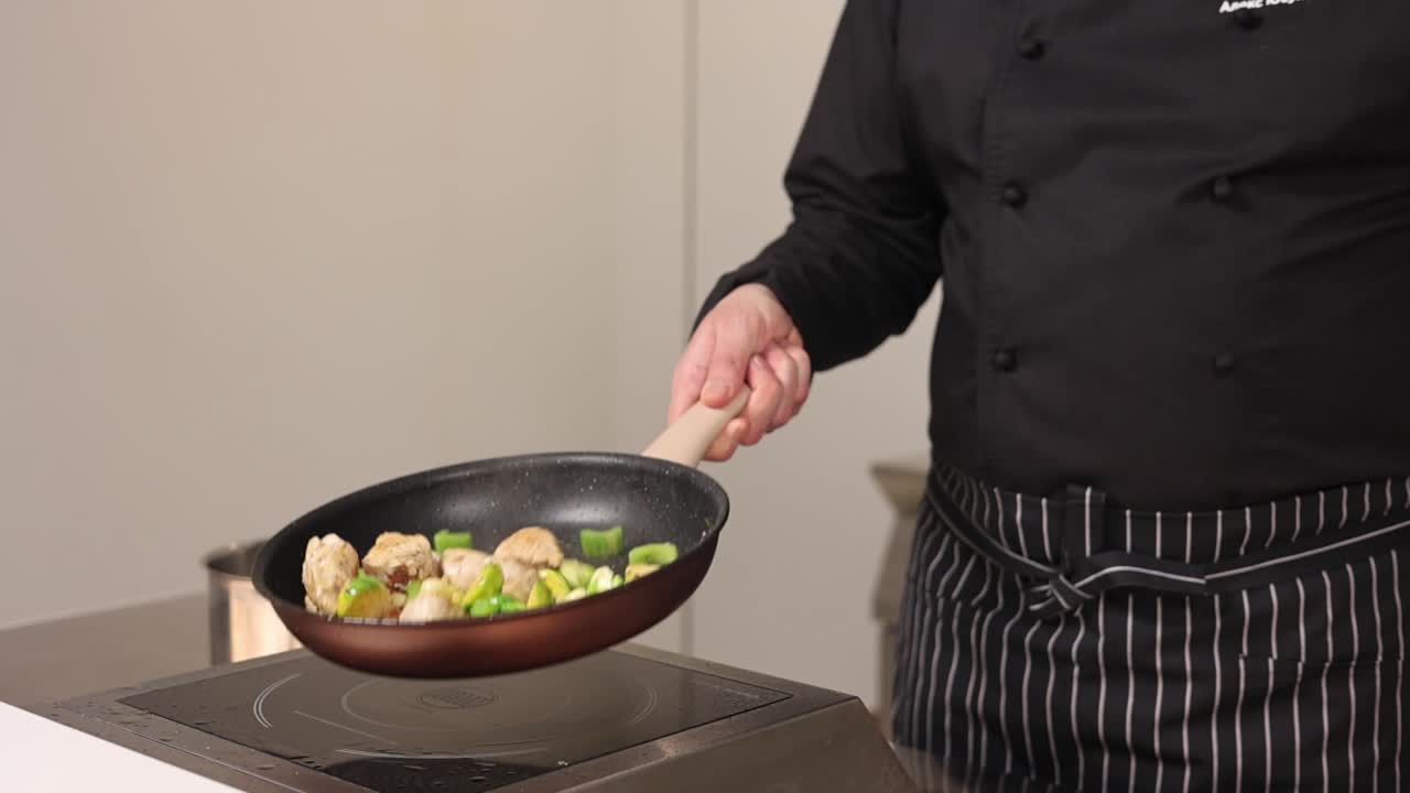 Chef Cooking Chicken and Vegetables