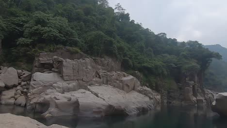 naturally-formed-white-shiny-stone-in-unique-shape-at-mountain-river-bed-at-morning-video-is-taken-at-Sliang-wah-Umngot-amkoi-jaintia-hill-meghalaya-india