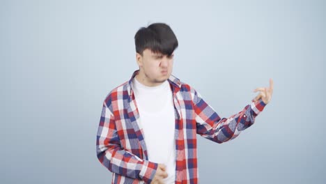 Man-doing-rocker-sign-and-dancing.