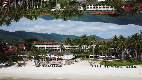 aerial view of a tropical resort with a unique reflection effect