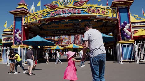 family enjoying a day at amusement park