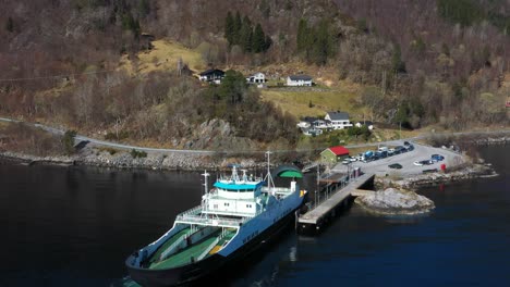 car ferry docks at solholmen ferry dock on the island of midsund