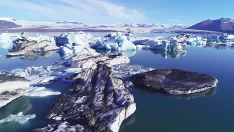 beautiful aerial over icebergs in the arctic jokulsarlon glacier lagoon in iceland 12