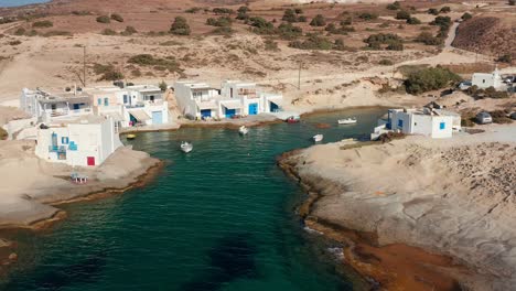 close up view of traditional and typical houses seaside in milos island, greek architecture