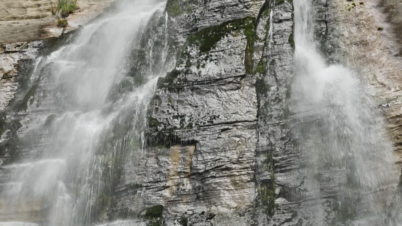 Water Flowing off Cliff at Shine Falls Waterfall in Puturino, New Zealand