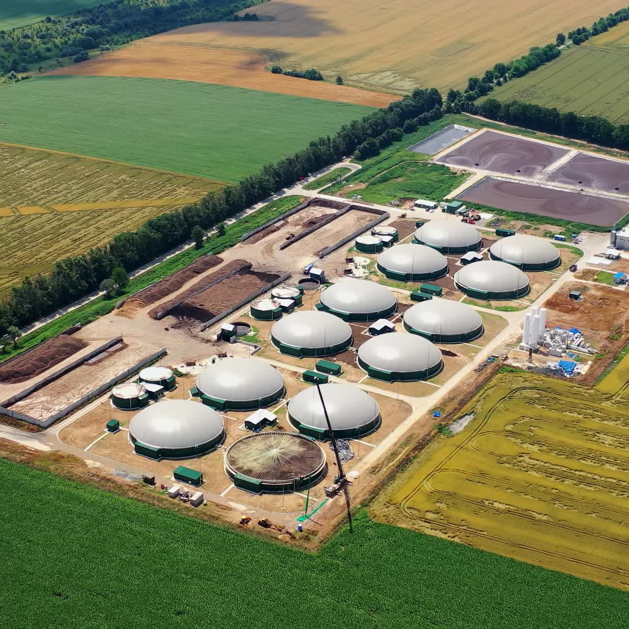 Aerial view on the modern bio gas station or factory. Bio gas plant. Sustainable production. Ecological production concept