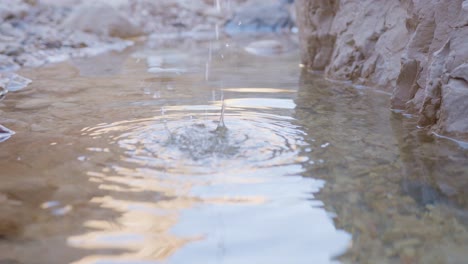 washing hands in desert spring