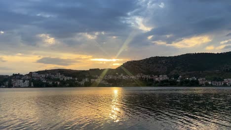 dramatic skyline over kastoria lake in greece - experience it in mesmerizing 4k detail