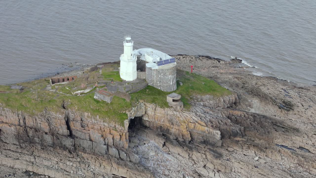 Selective focus on Mumbles Lighthouse situated near Swansea in England. Drone view.
