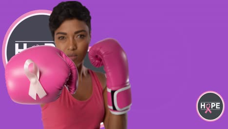 animation of breast cancer awareness text over biracial female boxer