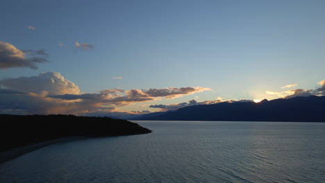 Aerial-view-of-wave-ripples-on-peaceful-blue-lake-in-New-Zealand