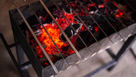 russian barbecue grill. mangal - brazier among the peoples of the middle east, a copper bowl on legs with wide horizontal fields, two carrying handles and a hemispherical lid.