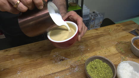 barista preparing a latte art