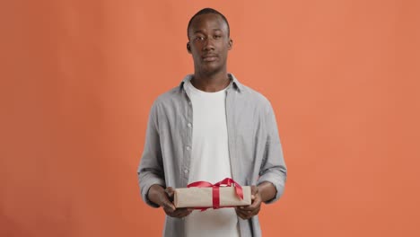 man giving a gift