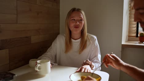 couple enjoying a meal together at home