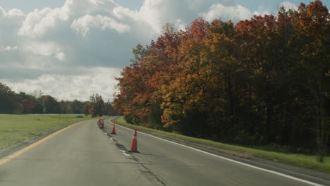 there are restrictive cones on the road - repair work, pit repair