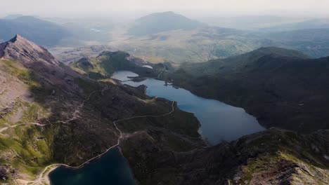 Aerial-drone-view-of-Glaslyn-and-Llyn-Llydaw-lakes-below-mount-Snowden-in-Snowdonia-Wales