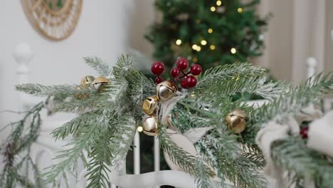 snowy pine branches with festive decorations