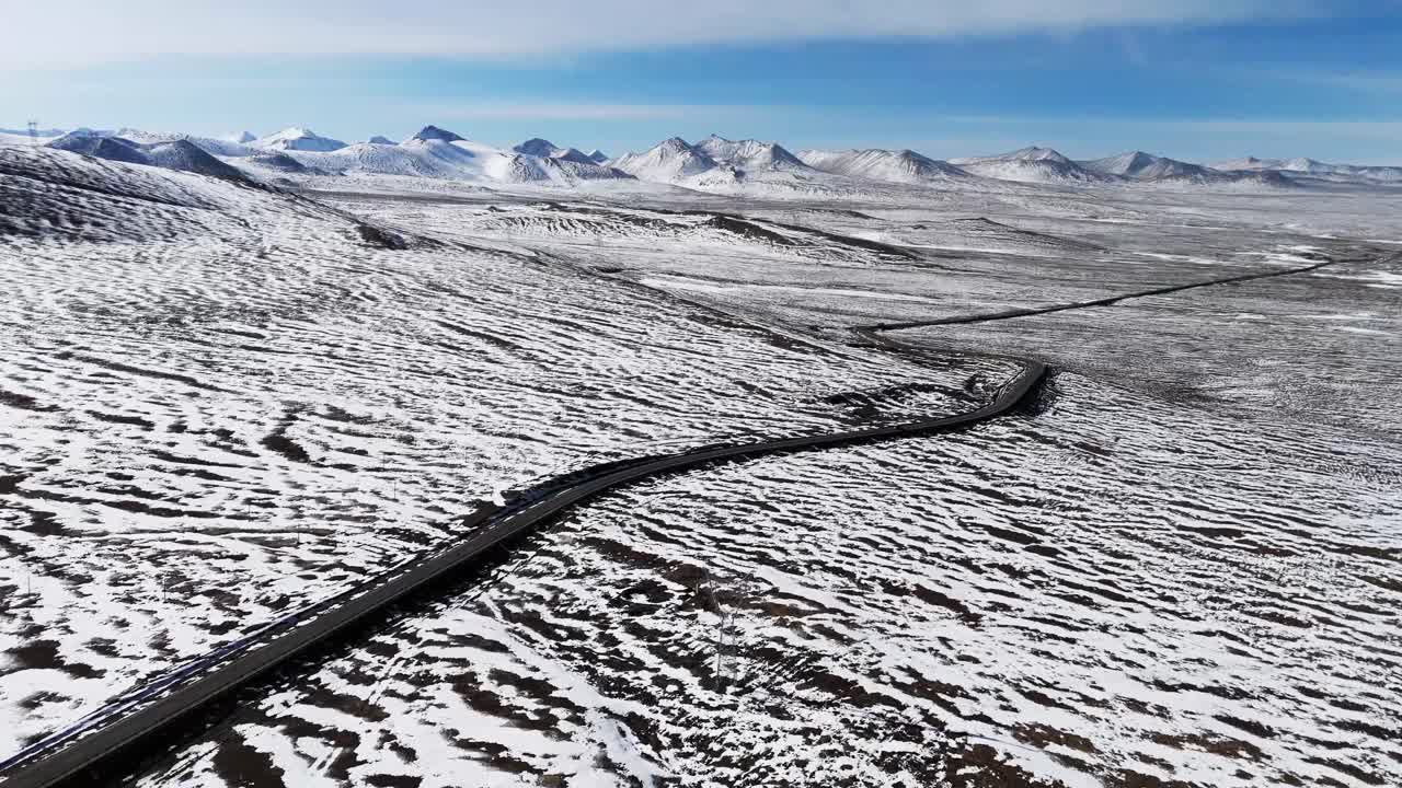 Aerial drone fly road, path through snowed Himalayan Mountains, traveling to Mount Everes