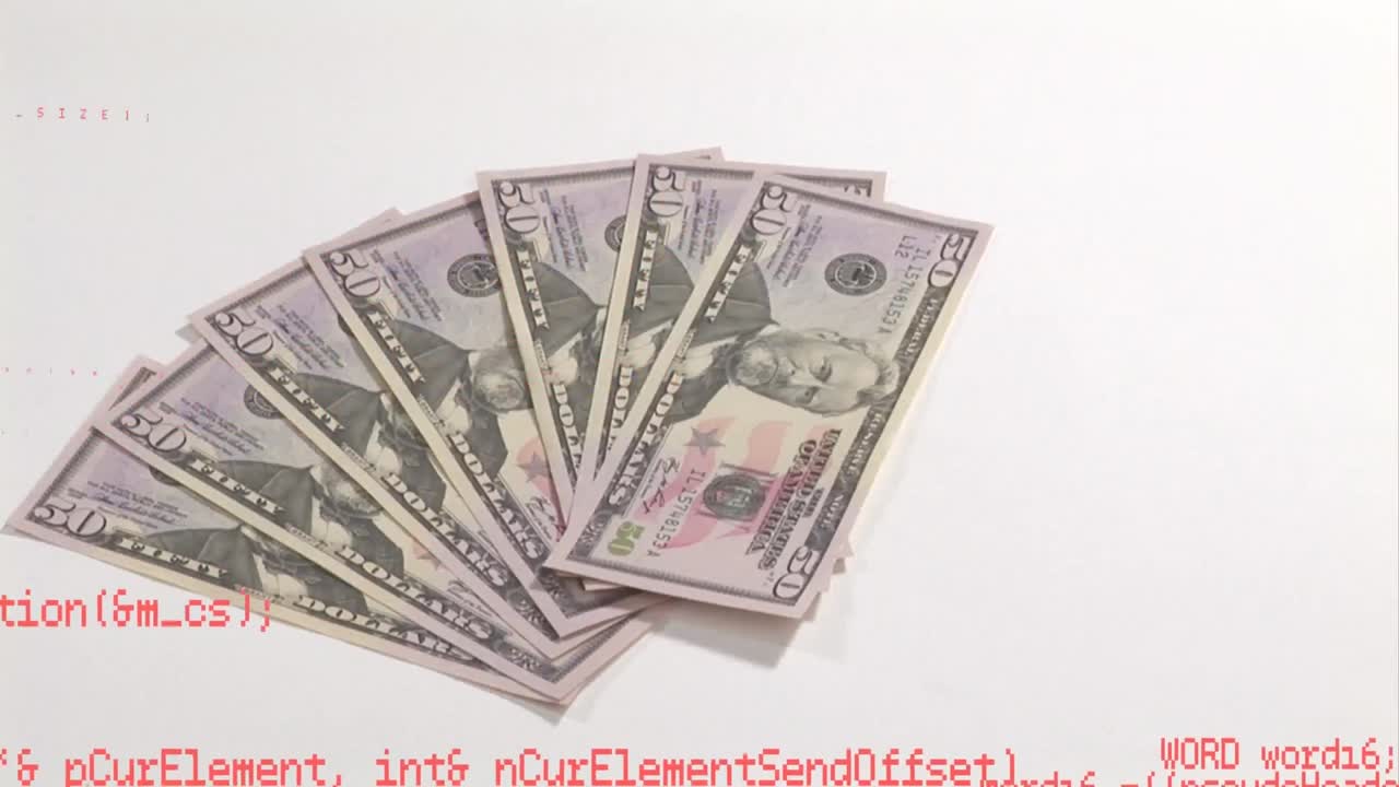 팬 모양 으로 배치 된 달러 지폐