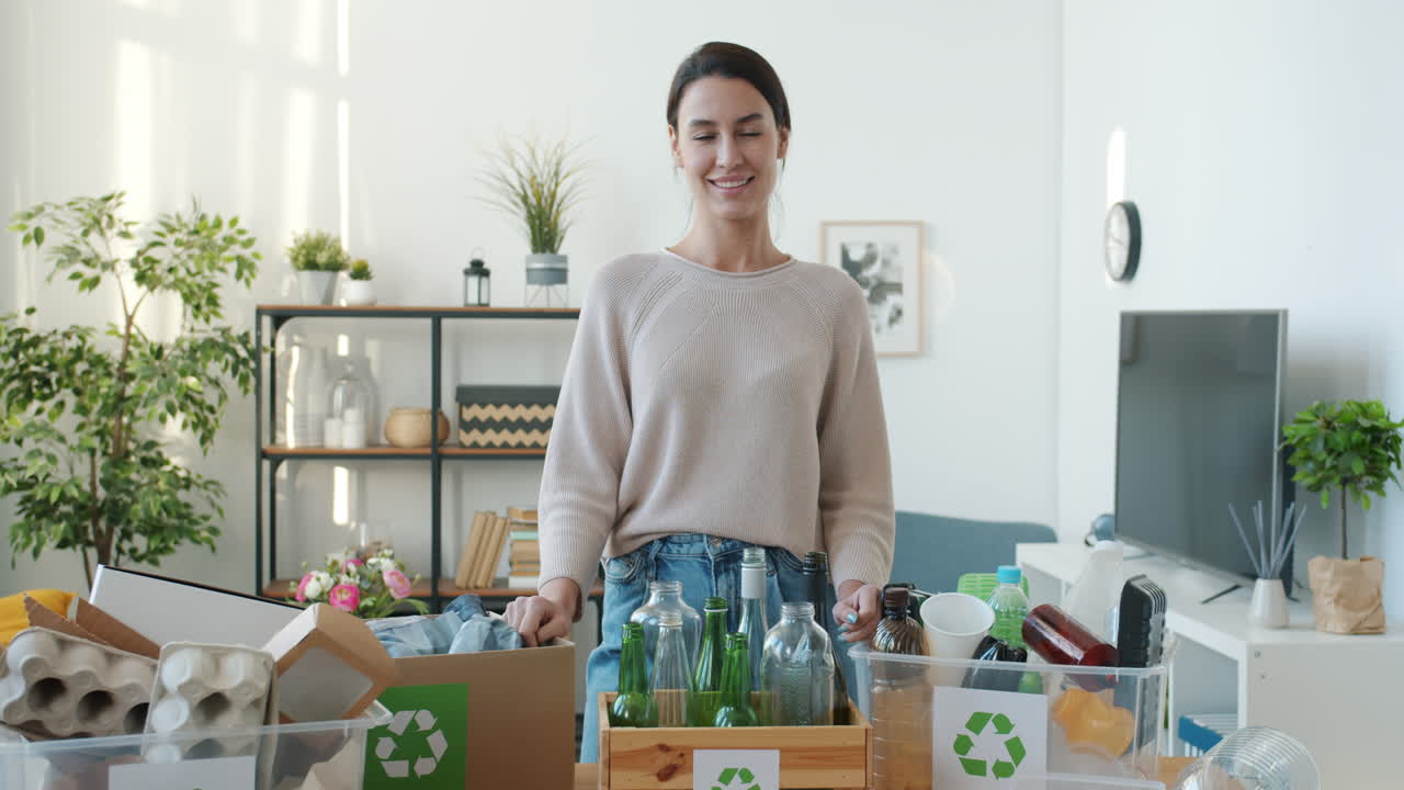 Woman Recycling at Home