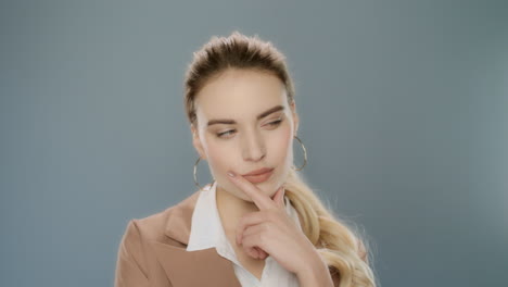 Young-business-woman-looking-around-in-studio