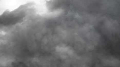 dark gray clouds filled with lightning strikes 4k