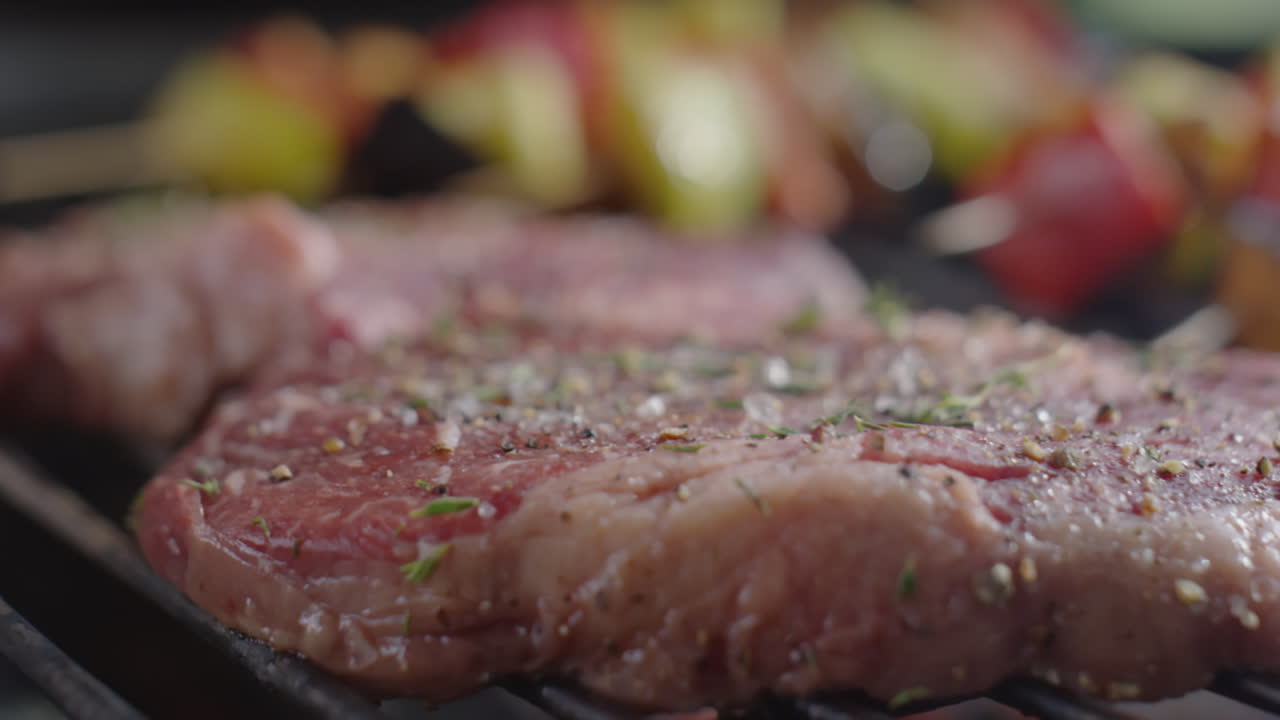 Beef Steaks Being Grilled on Barbecue