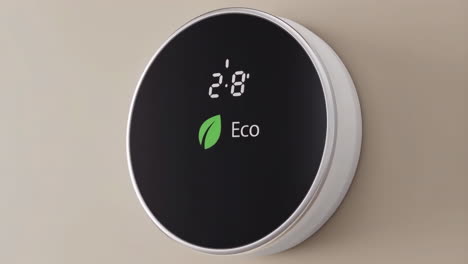 smart thermostat displaying temperature and eco mode