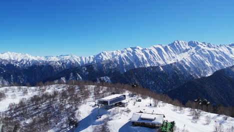 winter drone flight over mestia`s mountains in gerorgia