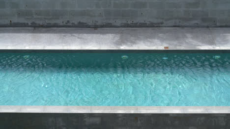 beautiful swimming pool with blue ripple water