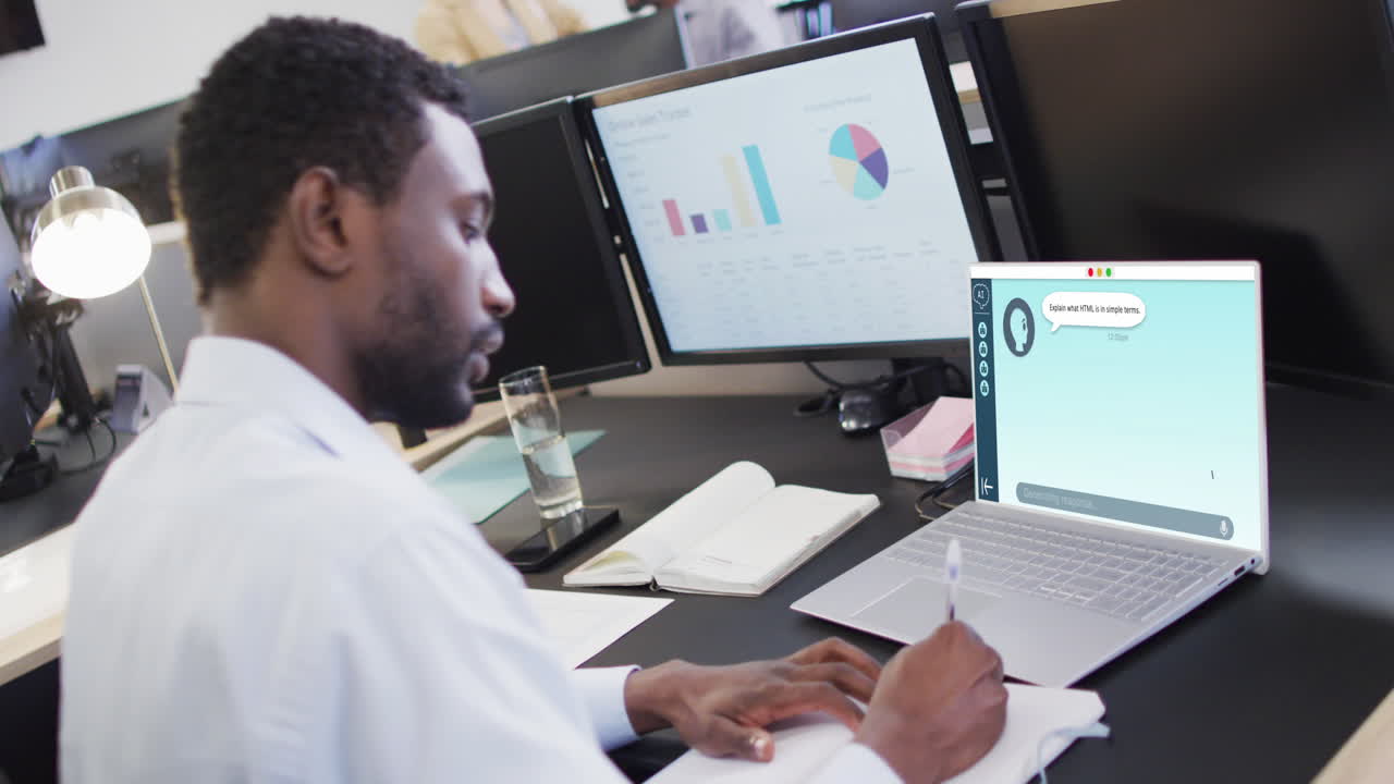 Composition of african american businessman using laptop with ai chat on screen