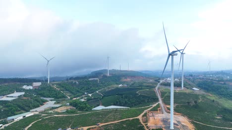 wind power turbines on high hills in vietnam at sunrise - wind power
