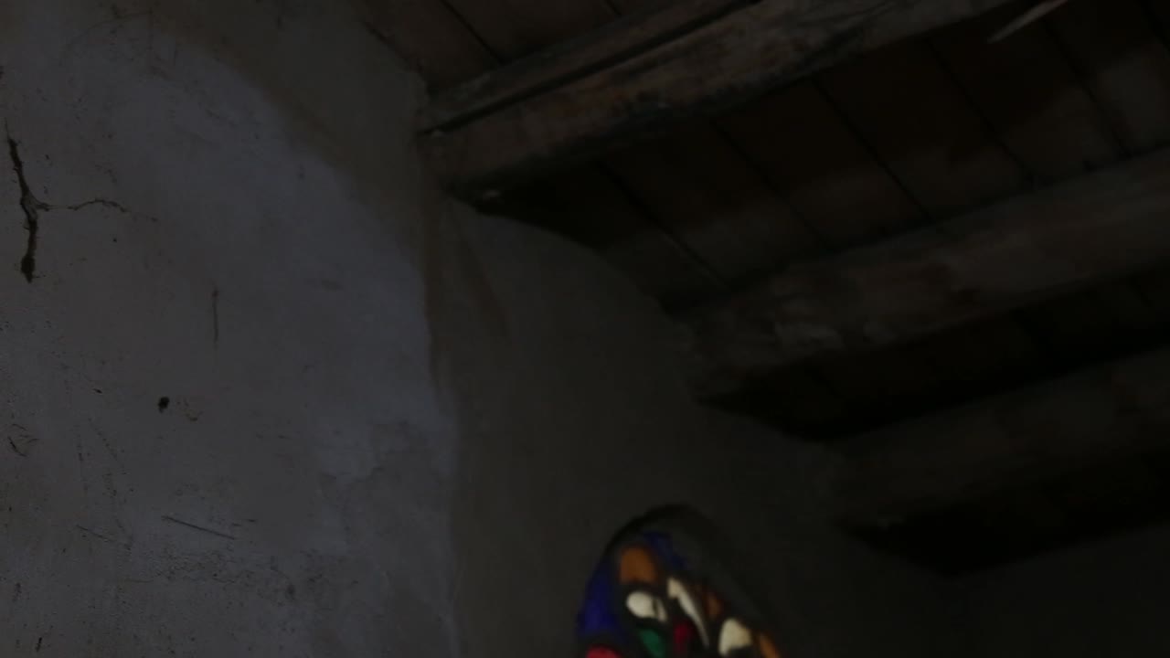 Antique Stained Glass Window in Old Building