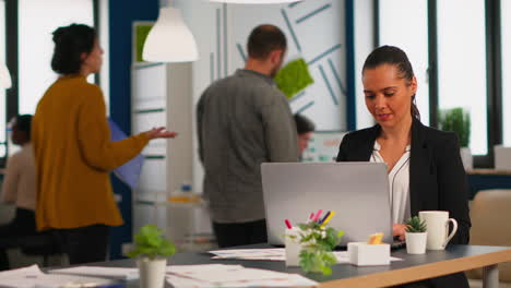 Enthusiastic-woman-manager-typing-on-laptop,-browsing-on-internet