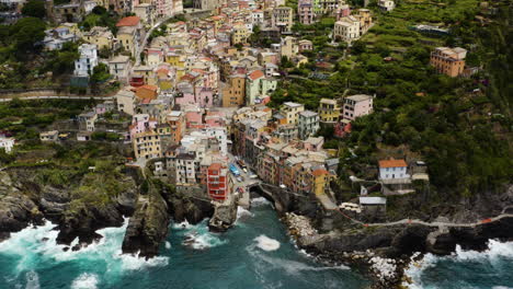 riomaggiore aerial pan establishing shot, italy coastline