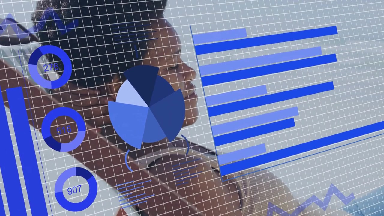 Clinician studying patient data for diagnosis while data feed updating overlay charts