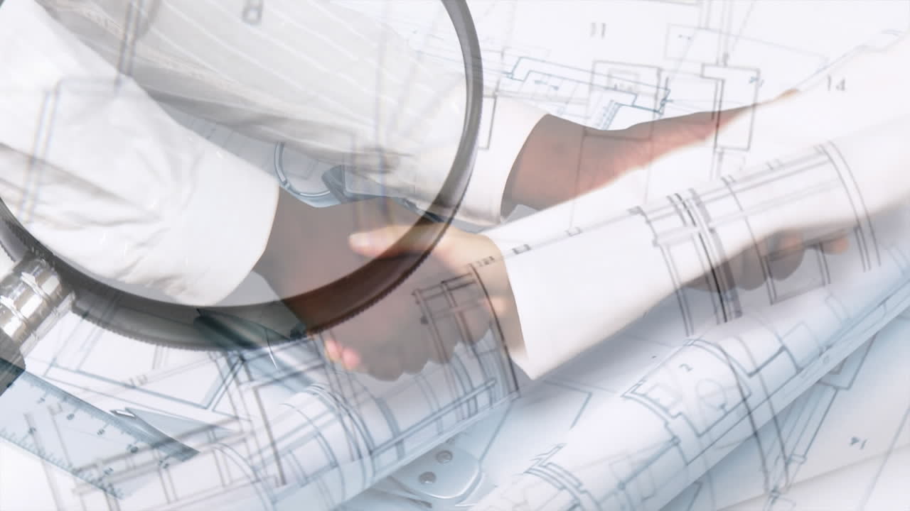 los arquitectos se dan la mano.